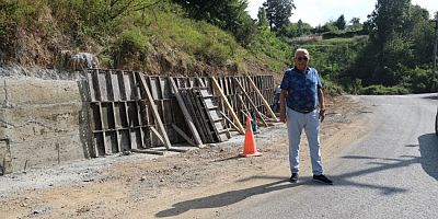 SARIKORKMAZ’DA YOL GENİŞLETME VE TAŞ DUVAR ÇALIŞMASI